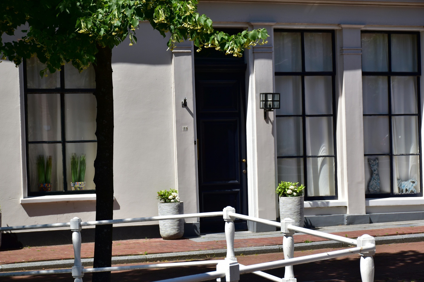 Evening light on the Lumière mews facade